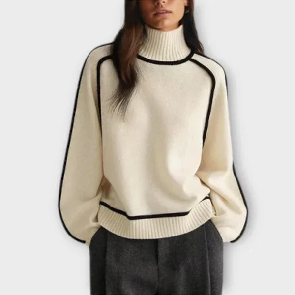 Emília - Elegantný sveter s vysokým golierom" can be rewritten as "Emília - Štýlový sveter s vysokým golierom.